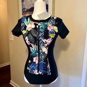 NWT, M Next Swim one piece rash guard. Short sleeves, lightweight, comfortable.